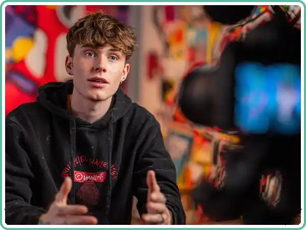 YouTuber Presenting to a Camera
